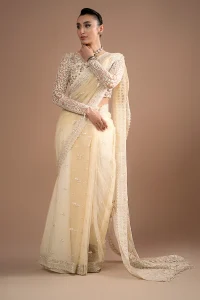 Traditional white saree for Pakistani bride with modern detailing